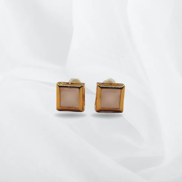 Rose gold glossy stud earrings with elegant round design – suitable for daily wear by women and girls