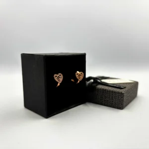 "Heart-shaped gold finish clip-on earrings with CZ stones"