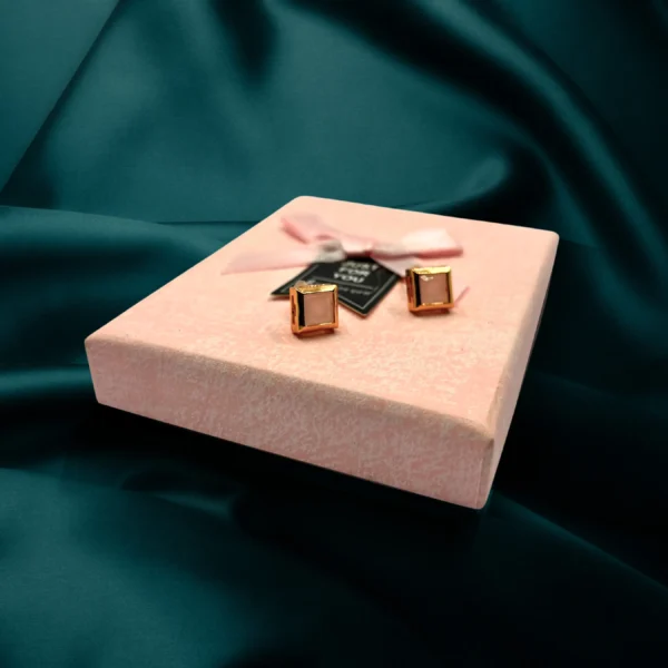 Rose gold glossy stud earrings with elegant round design – suitable for daily wear by women and girls