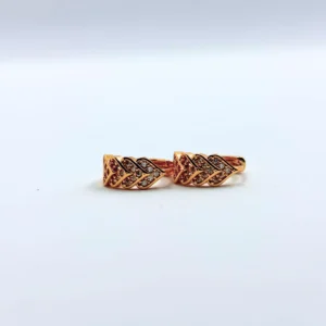 Gold-plated leaf pattern earrings with American diamond stones