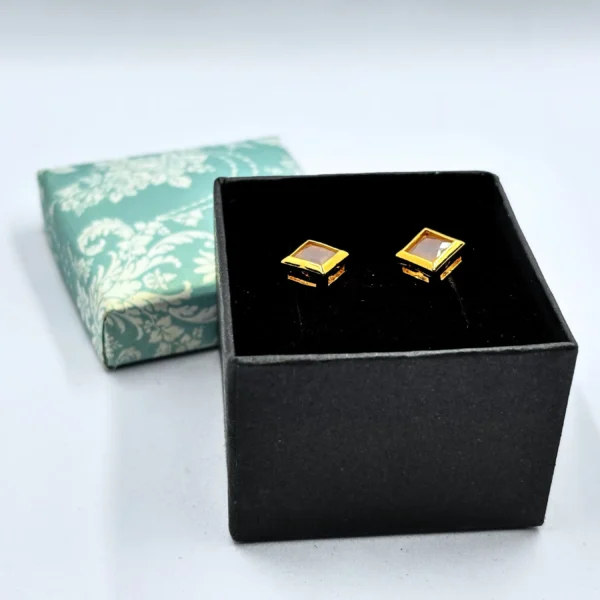 Rose gold glossy stud earrings with elegant round design – suitable for daily wear by women and girls