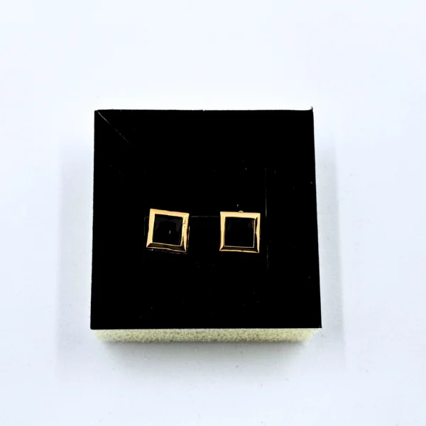 Black square stud earrings with gold frame – minimalistic fashion jewelry